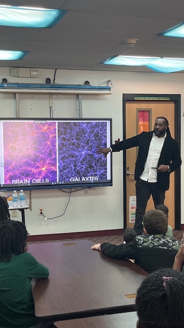 Ryan Bailey Sr. speaking with students